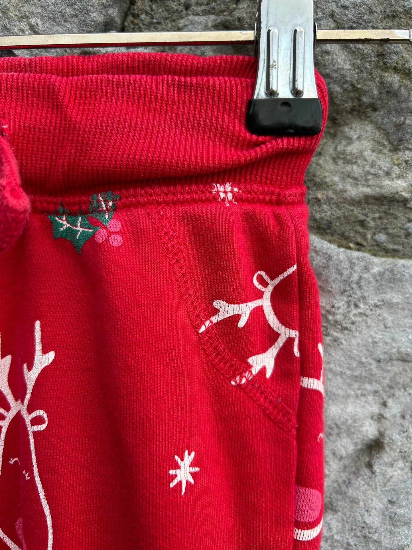 Red reindeer tracksuit bottoms 2-3y (92-98cm)