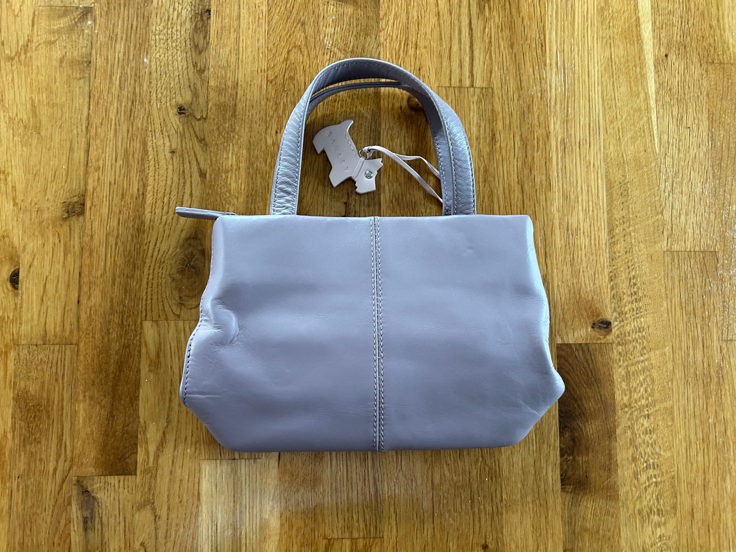 Tiny mauve handbag