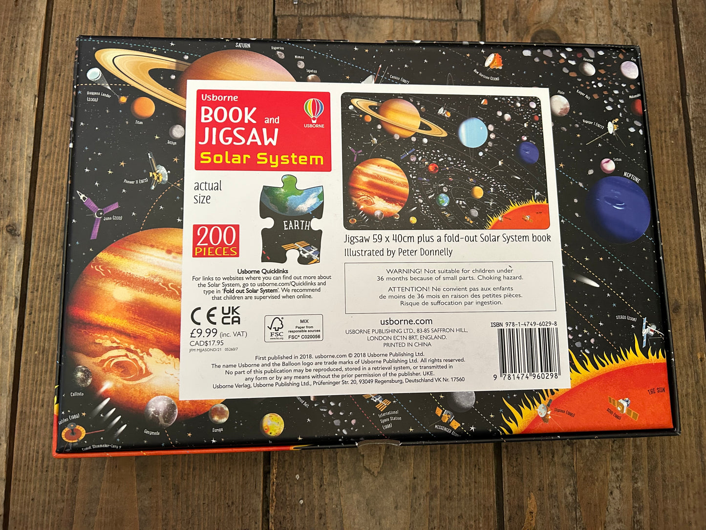 Book and jigsaw solar system