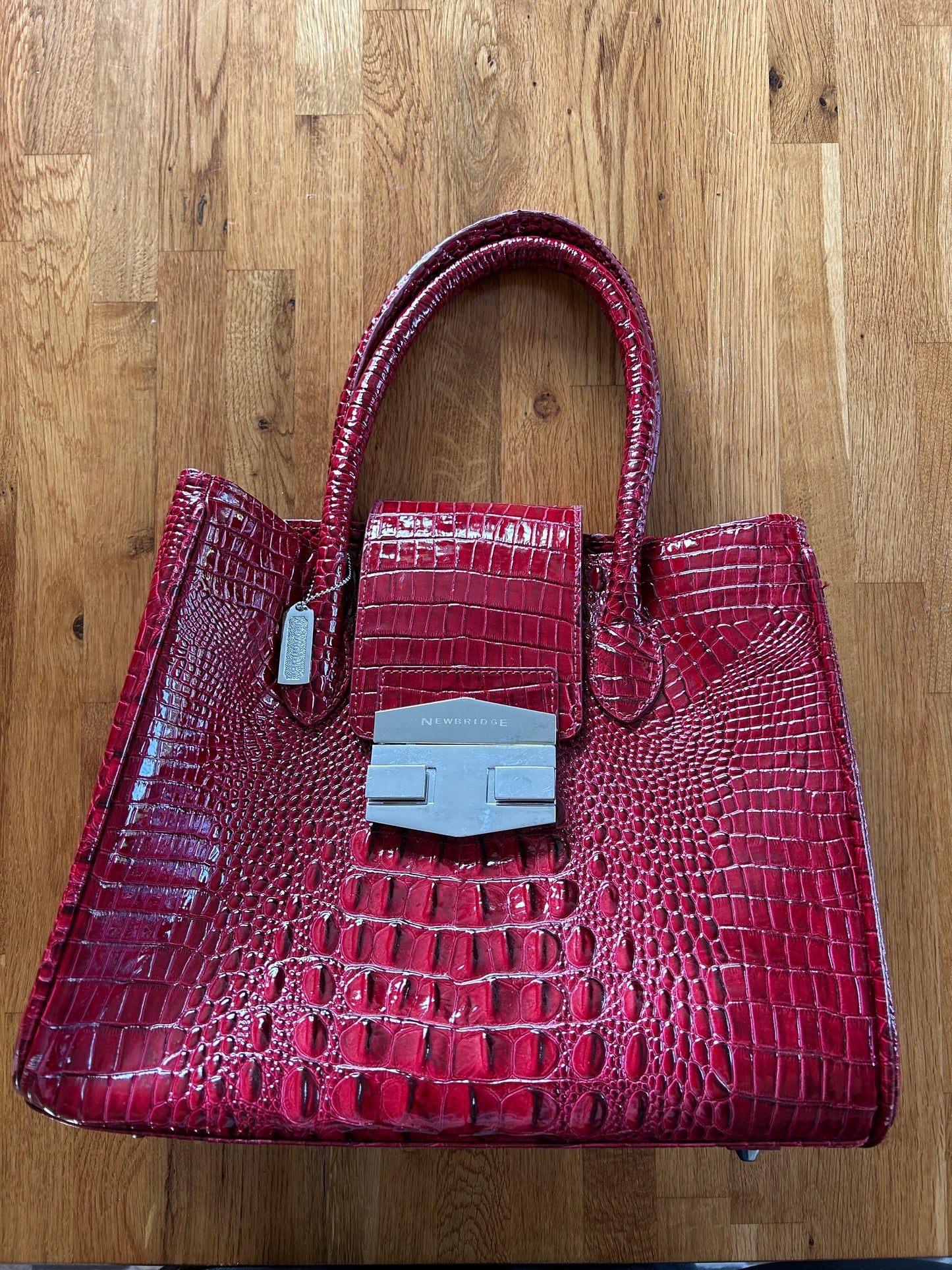 Red crocodile style handbag