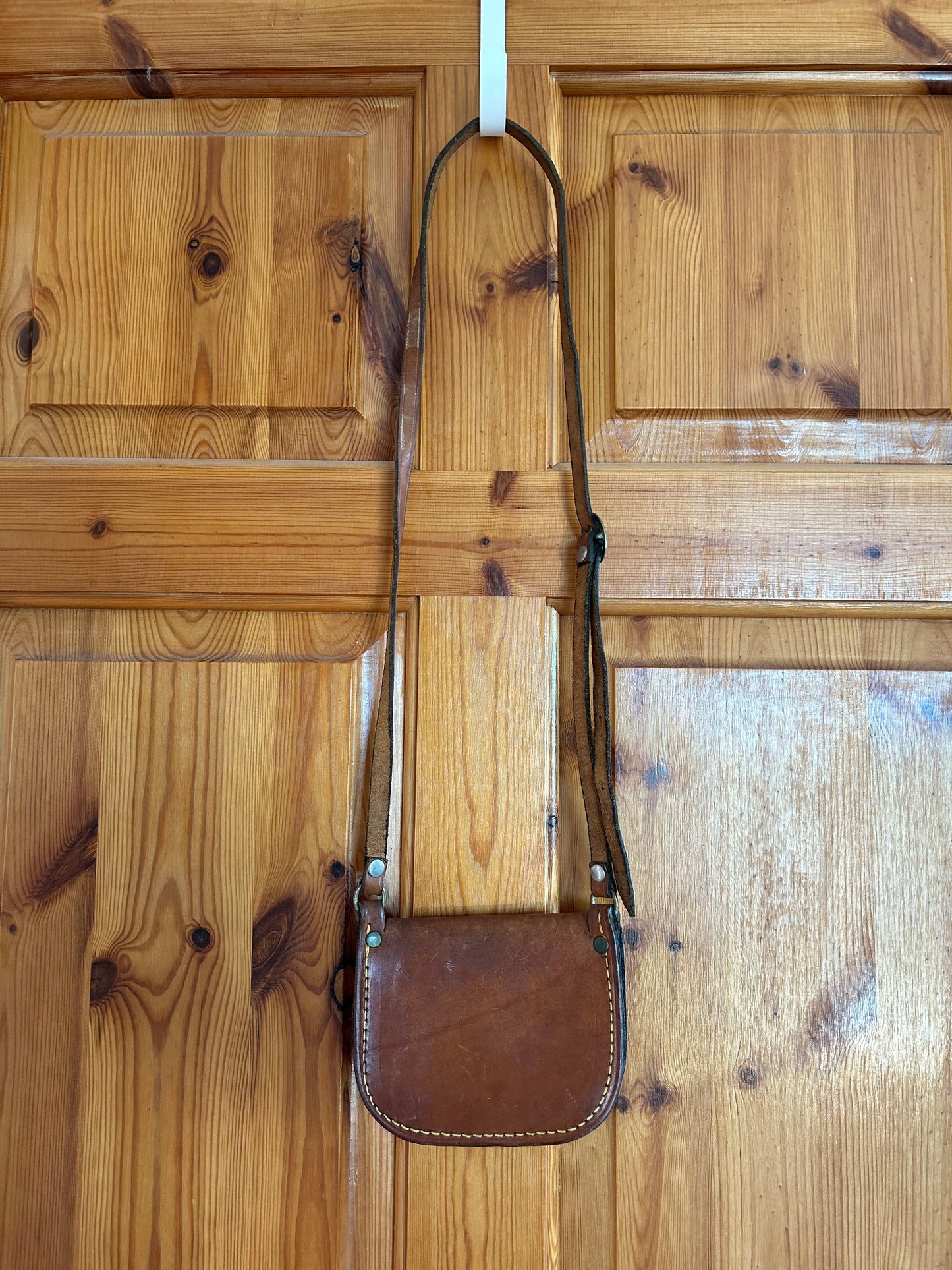 Small brown leather bag
