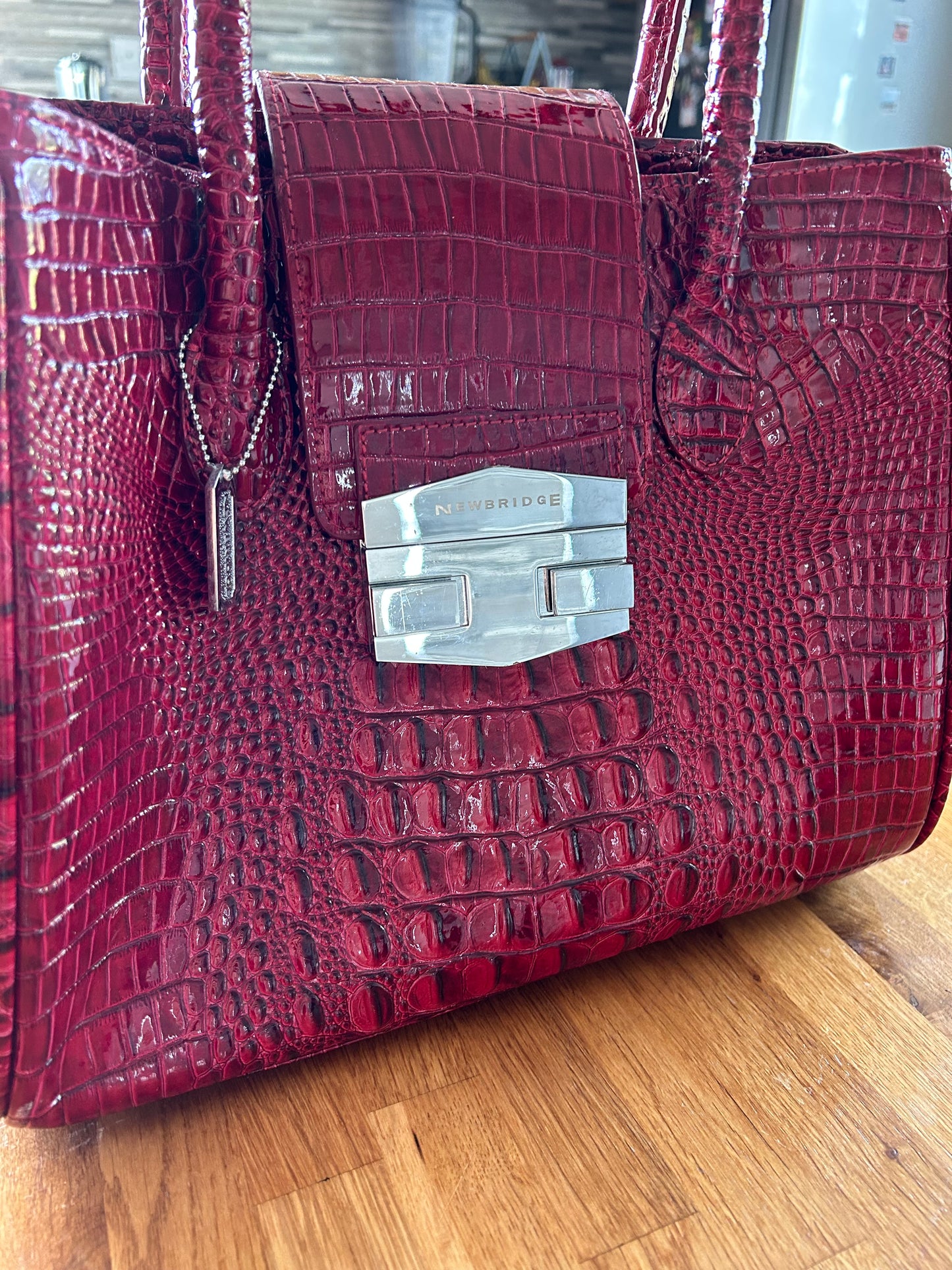 Red crocodile style handbag