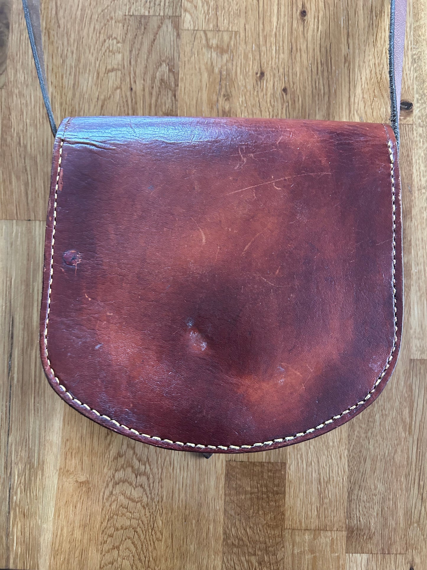 Brown leather crossbody bag