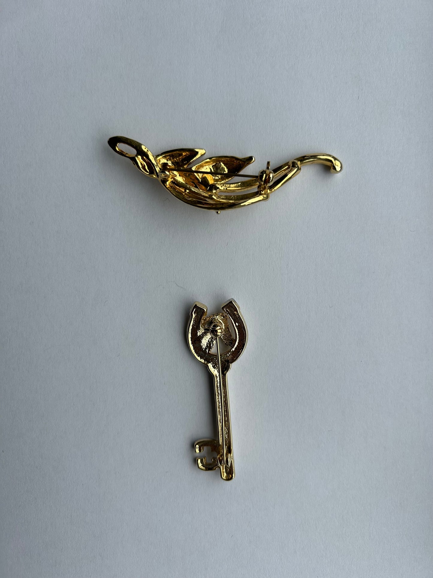 Golden brooch set