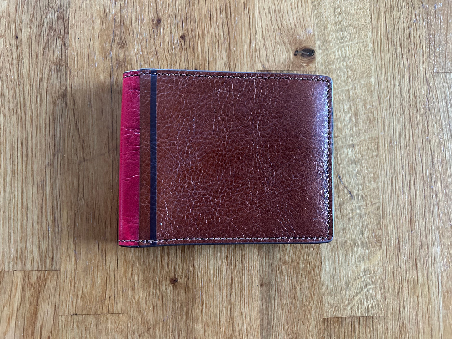 Brown and red wallet