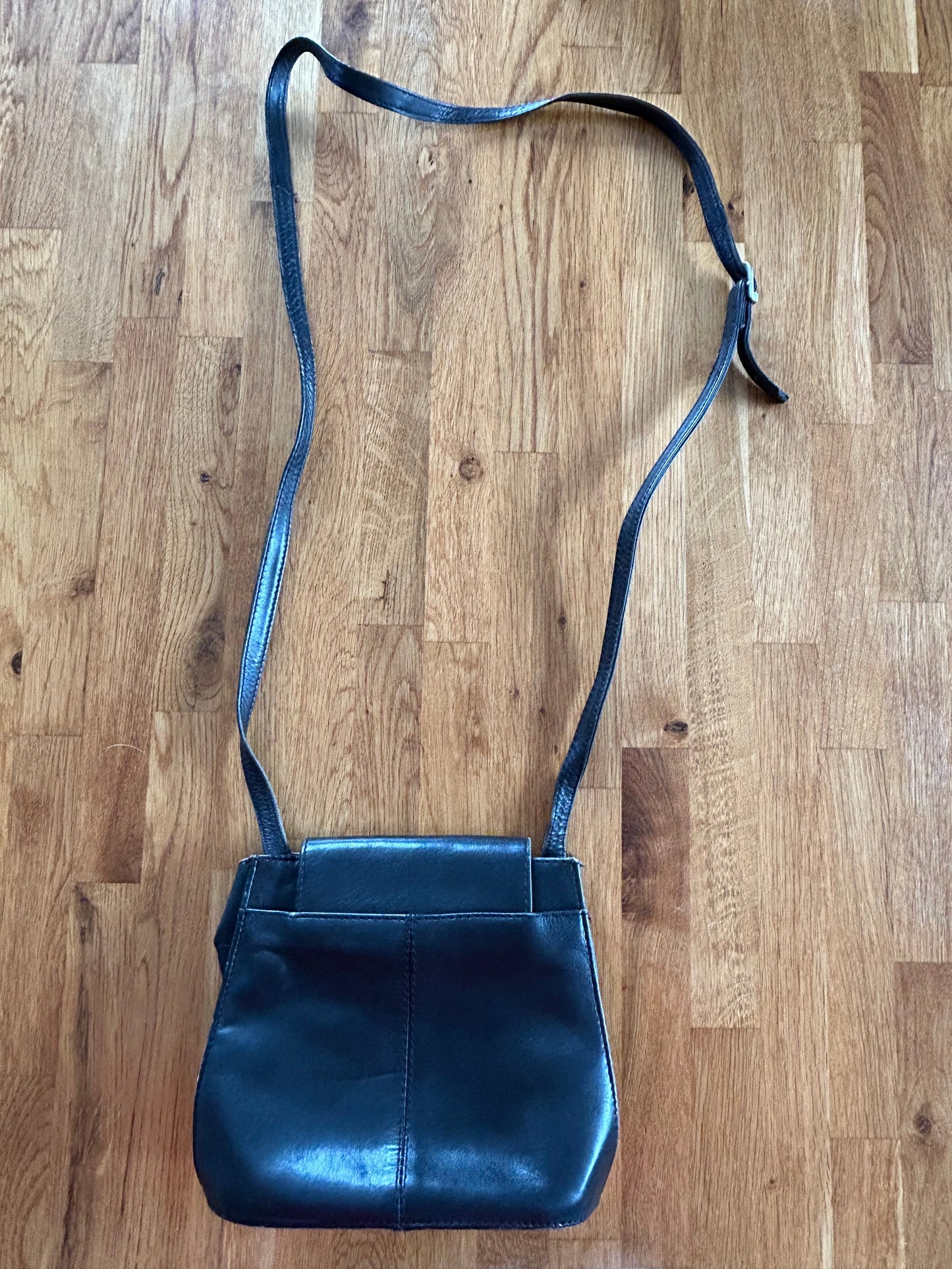 Small black leather crossbody bag