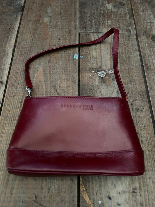 Small maroon handbag