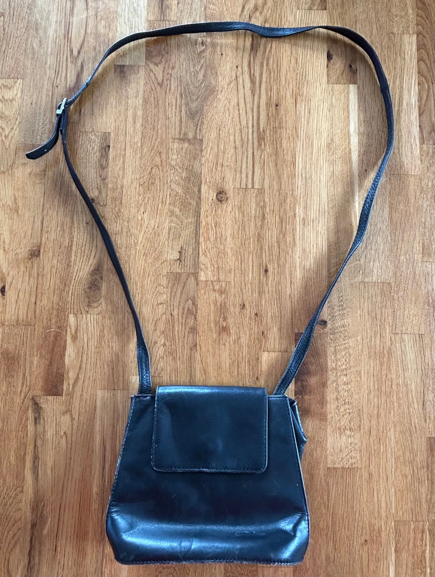 Small black leather crossbody bag