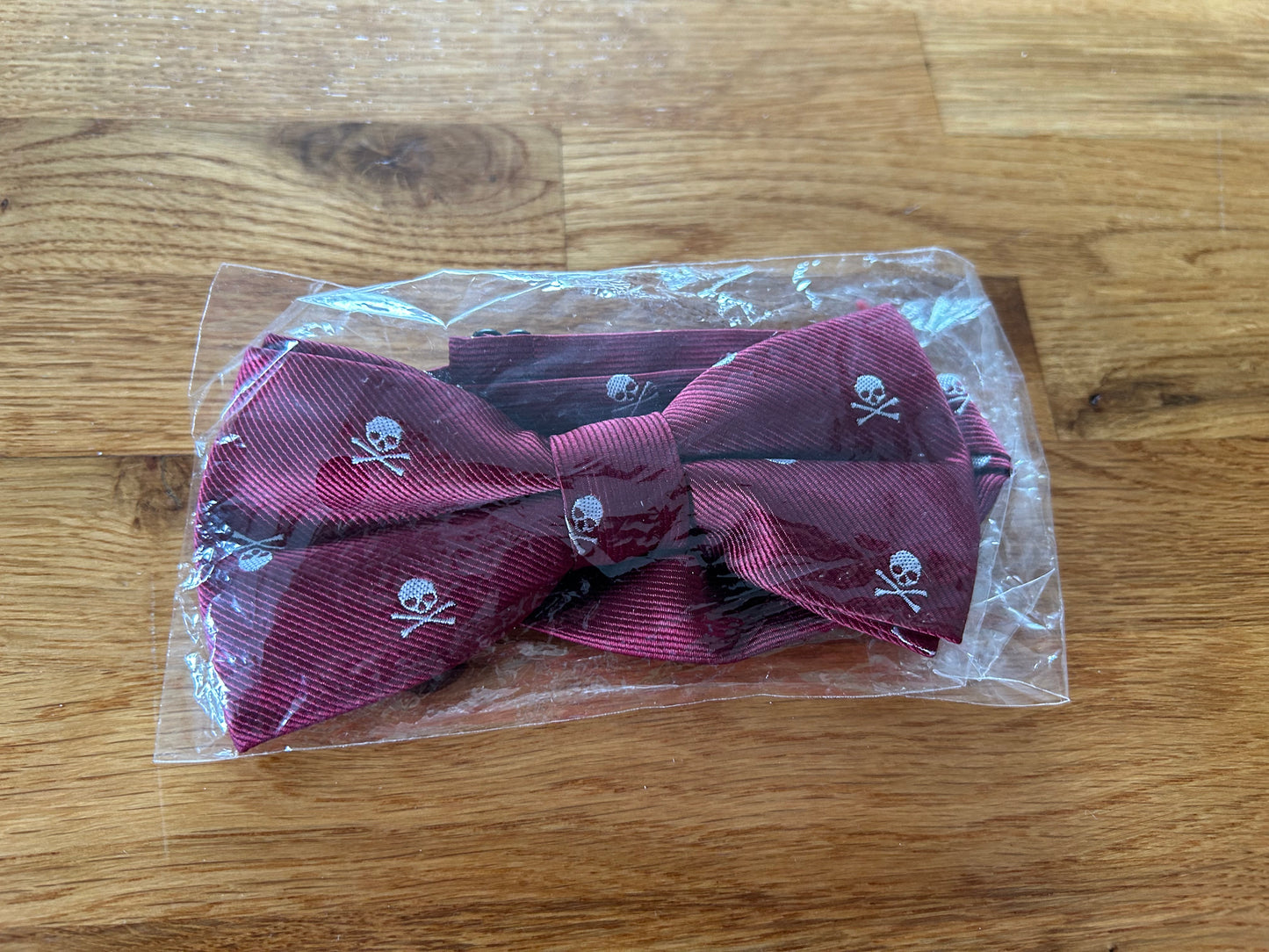 Maroon skull bow tie