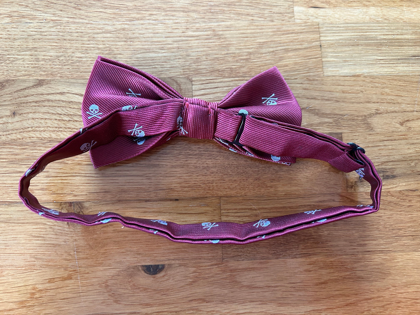 Maroon skull bow tie