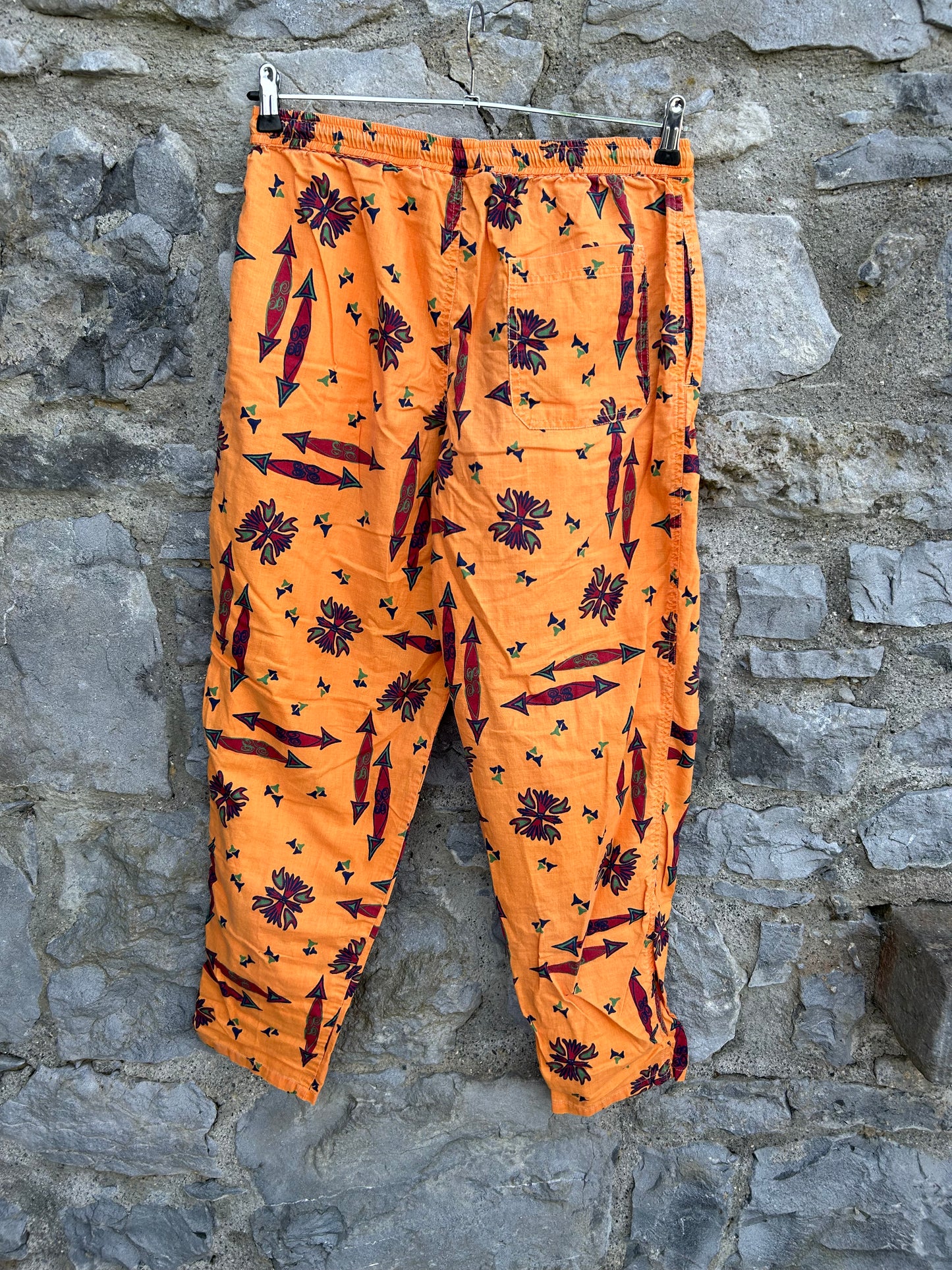 90s orange tribal print pants uk 12-14