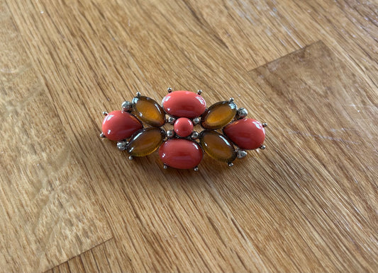 Coral and orange brooch