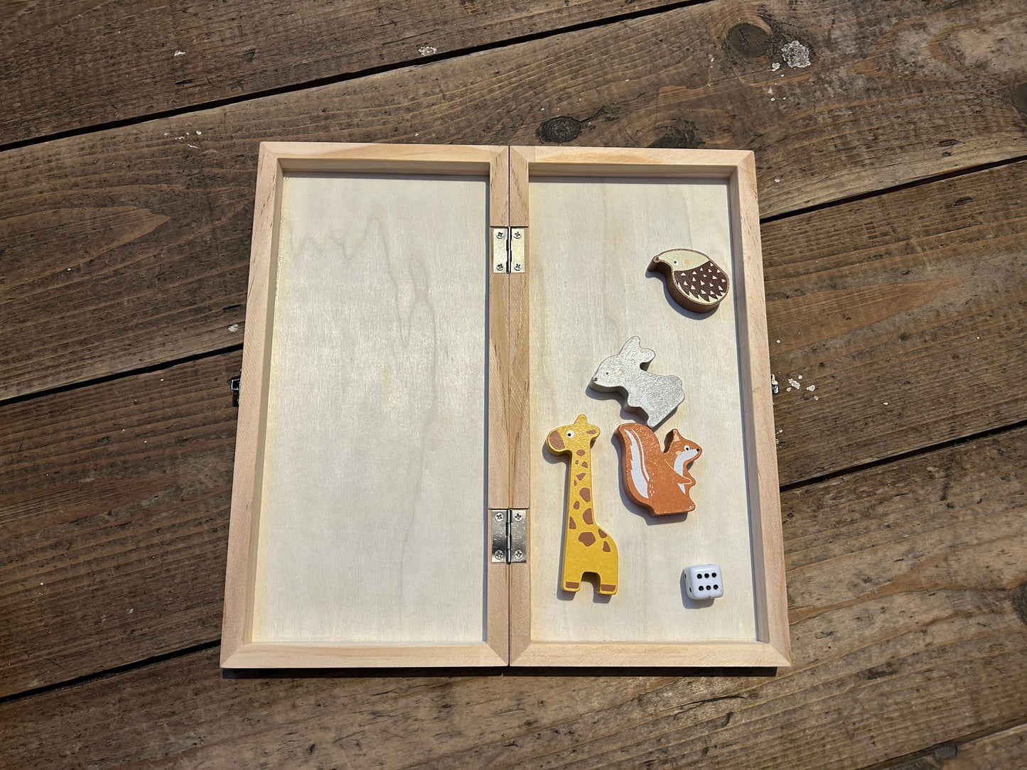Wooden snake and ladders game