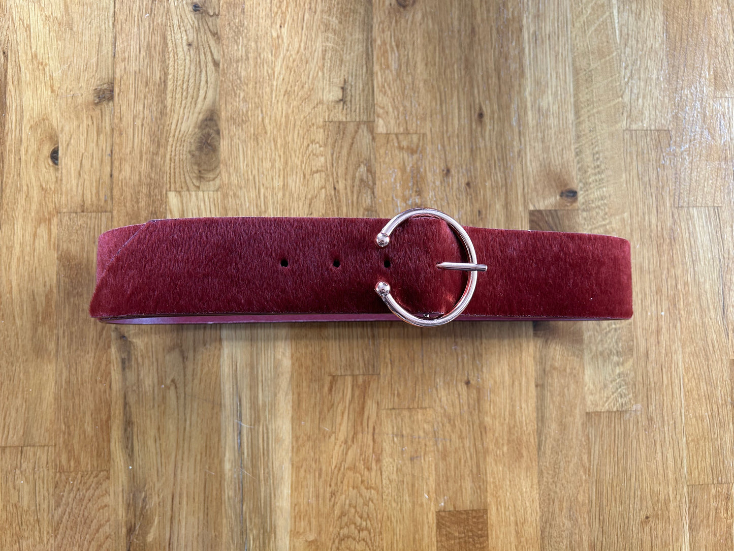 Maroon hairy belt