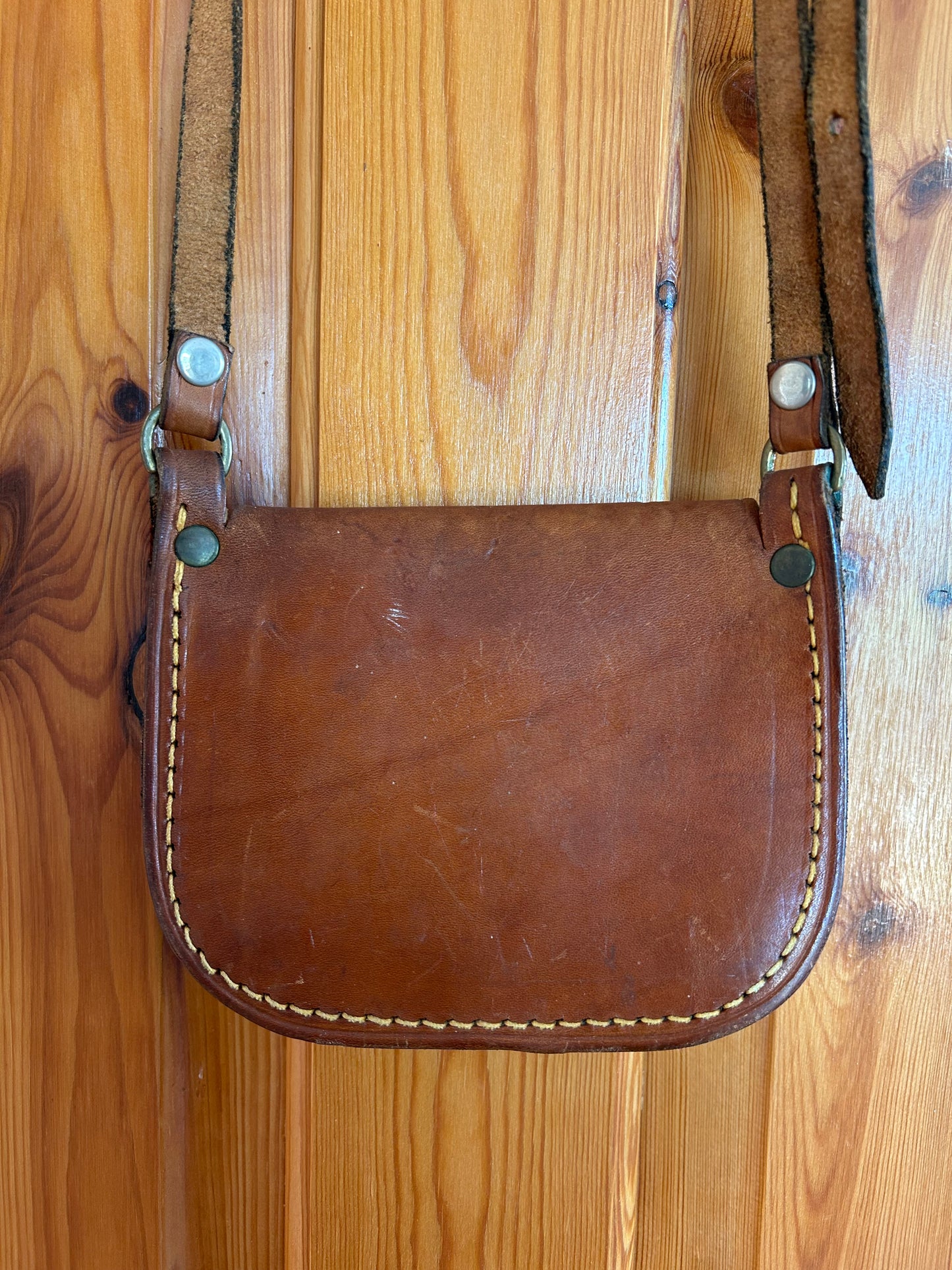 Small brown leather bag