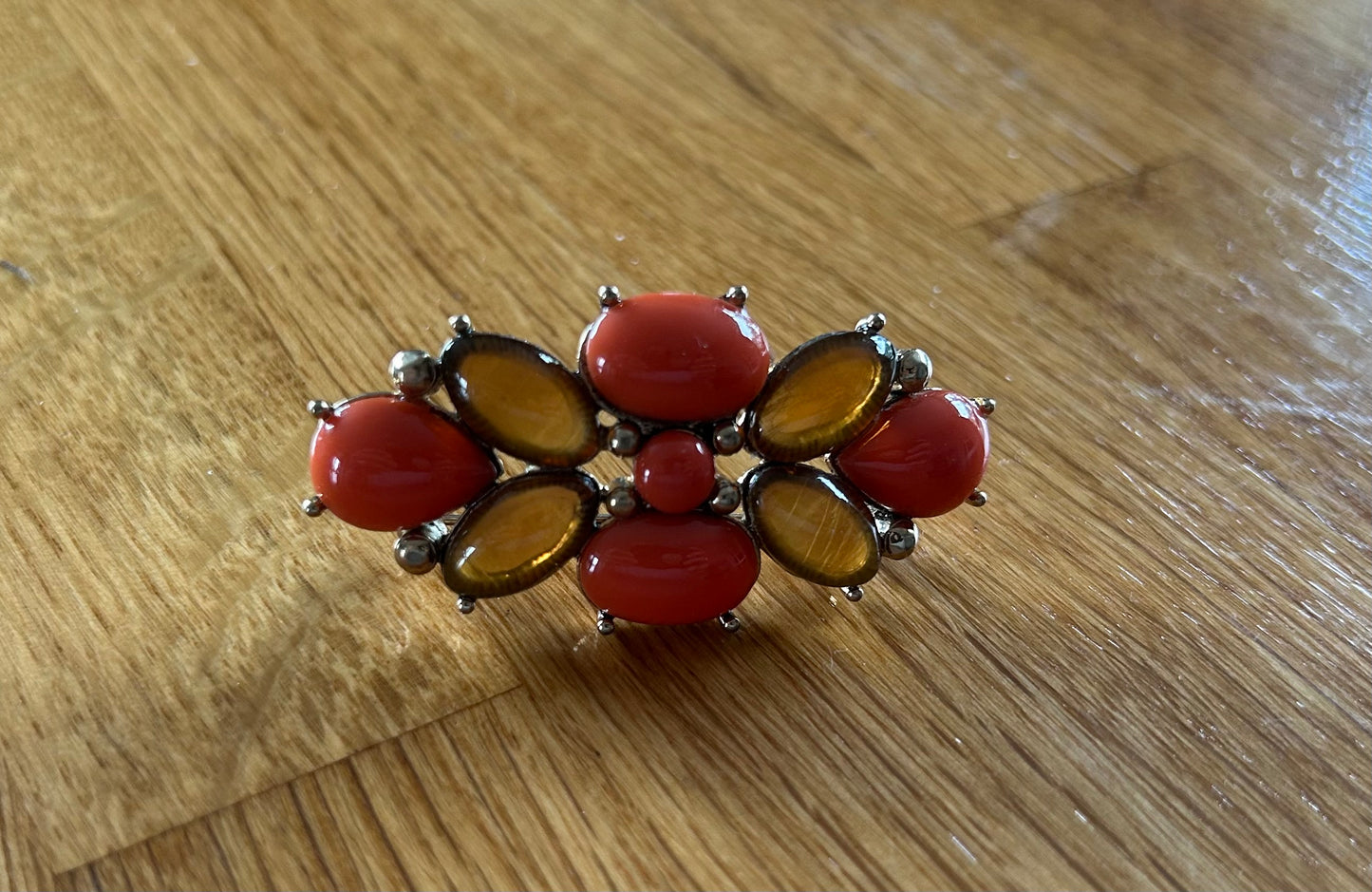 Coral and orange brooch