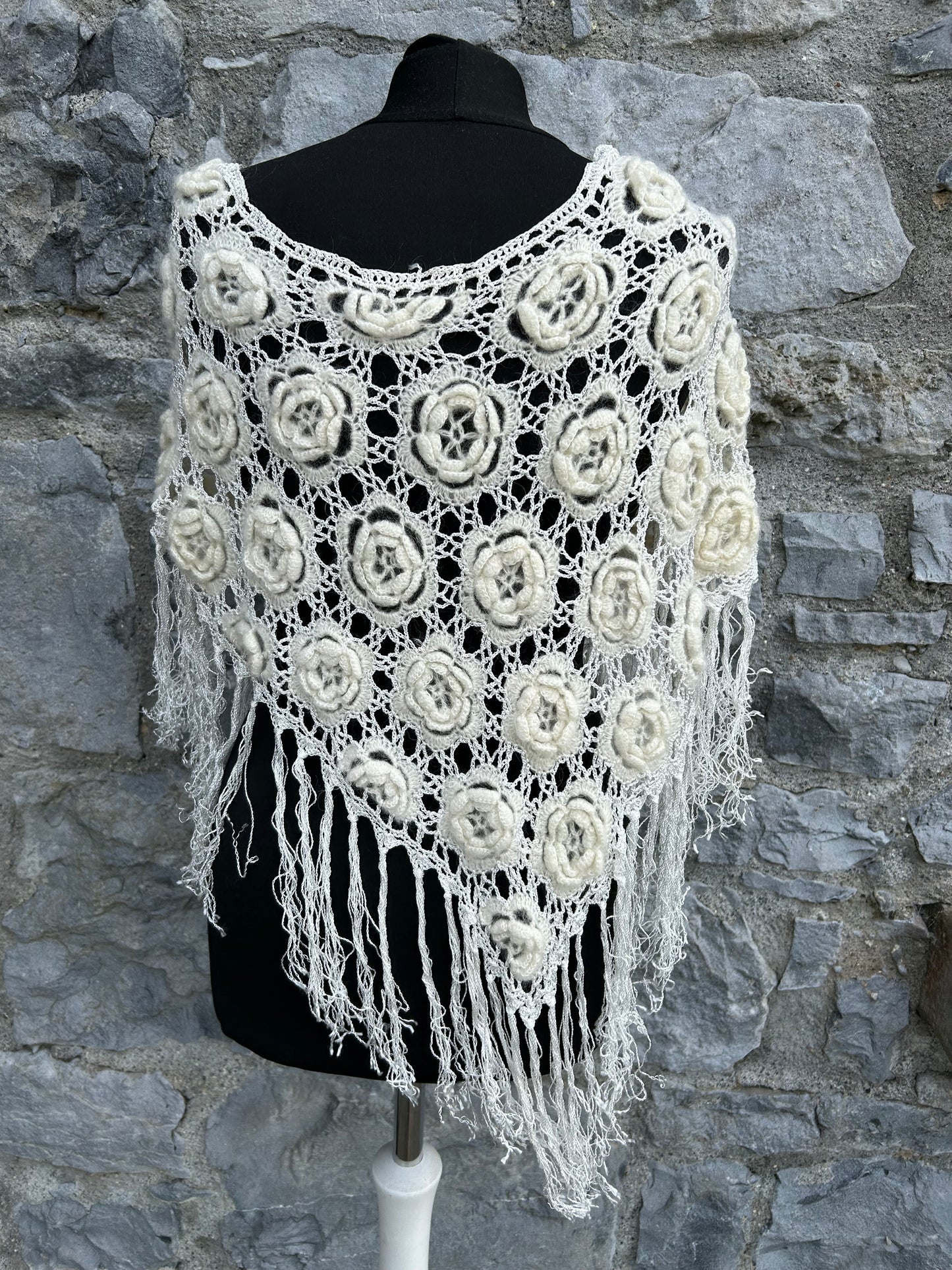 Crochet flowers poncho