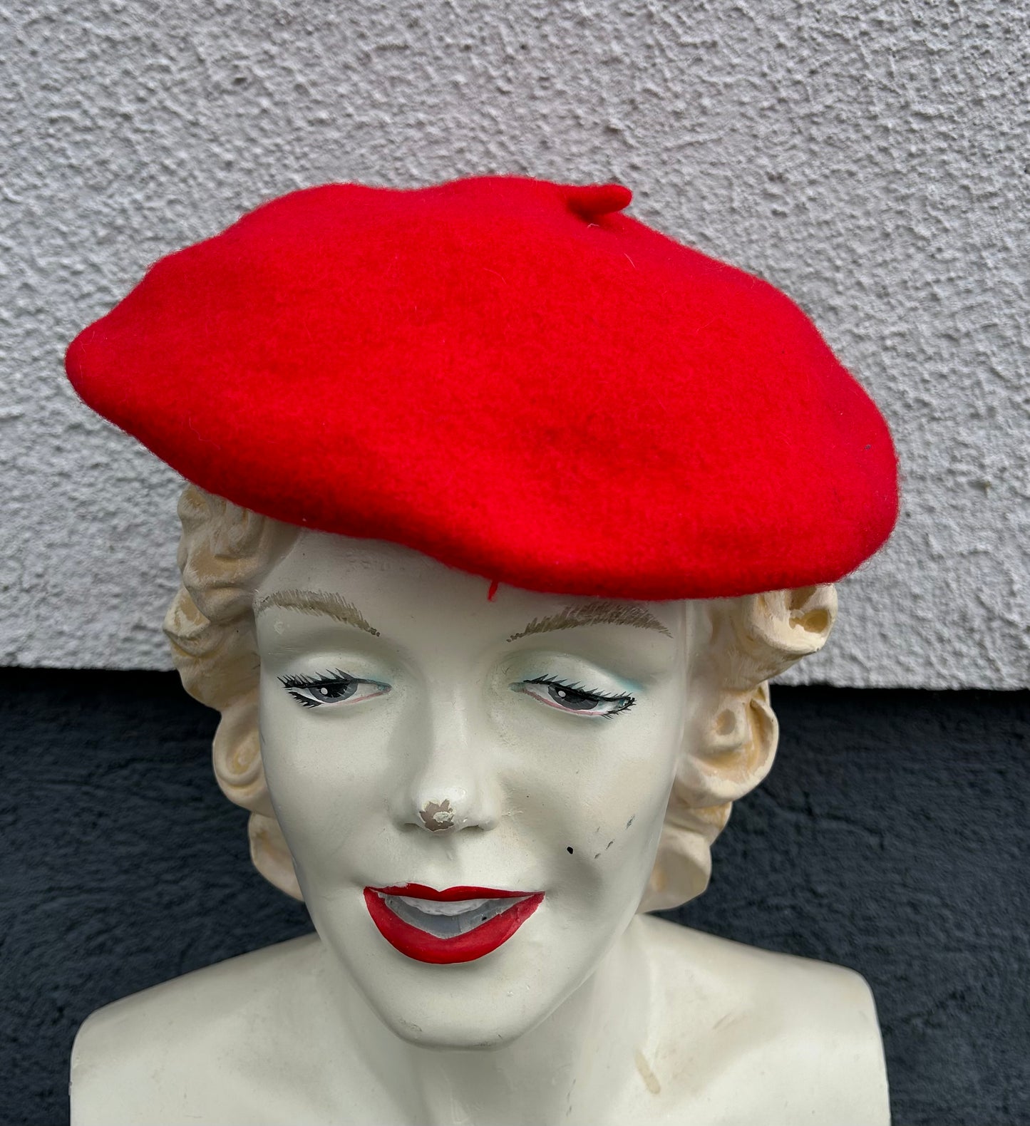 Bright red béret hat