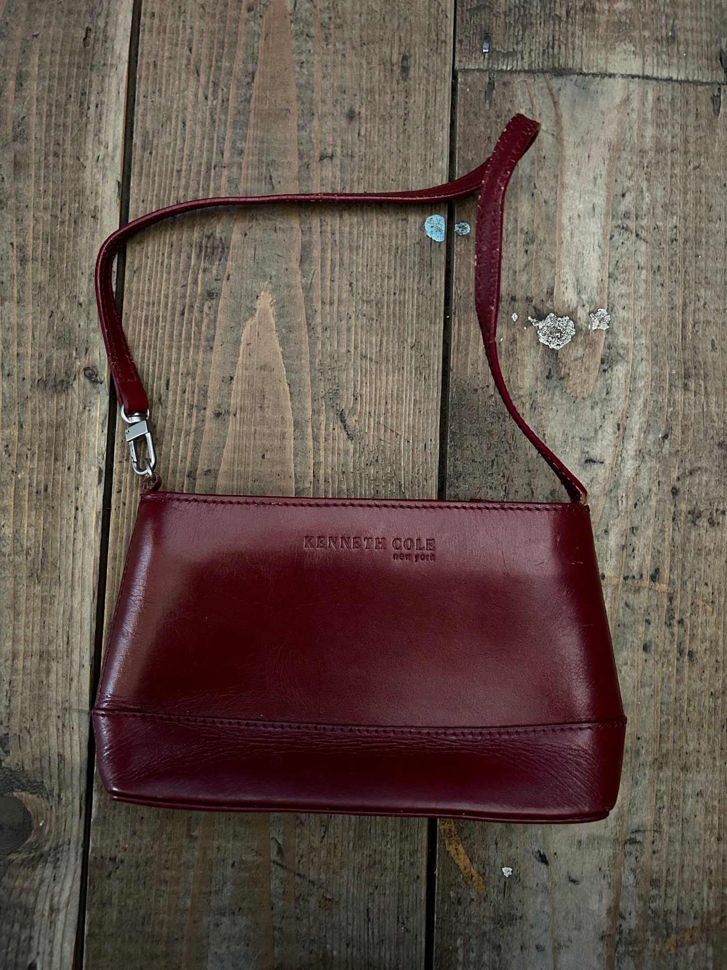 Small maroon handbag