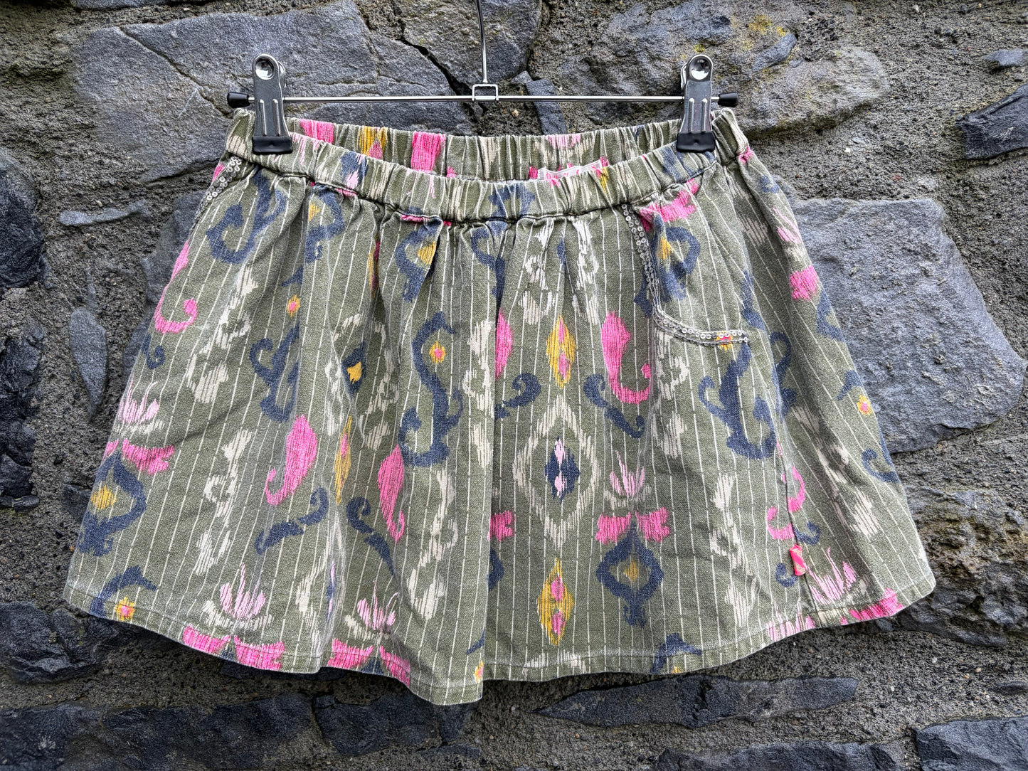 Khaki skirt with a Ikat print  7-8y (122-128cm)