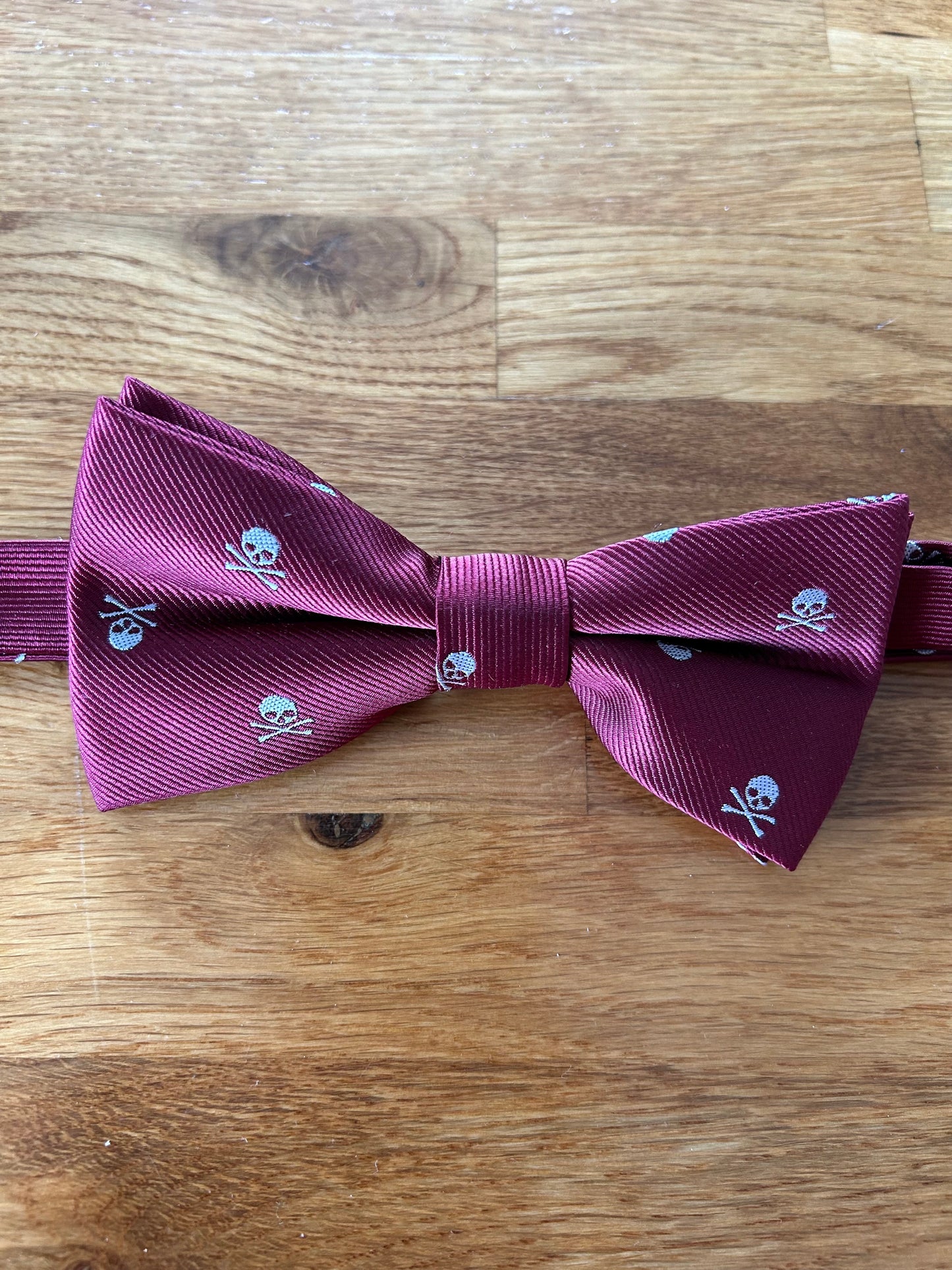 Maroon skull bow tie