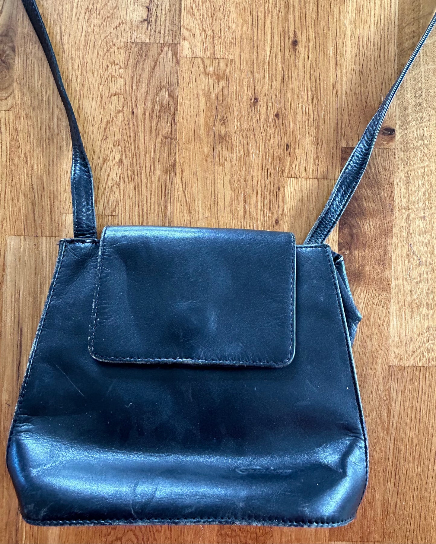 Small black leather crossbody bag