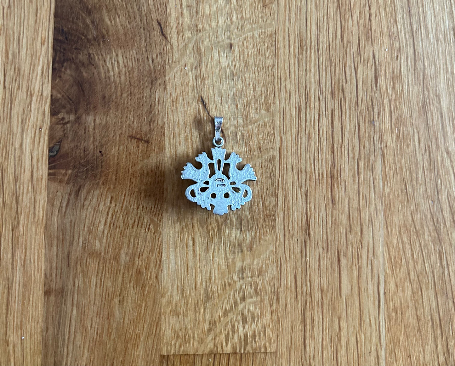 Bird’s silver pendant