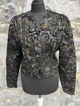 Load image into Gallery viewer, 80s black&amp;gold velvet jacket uk 8-10
