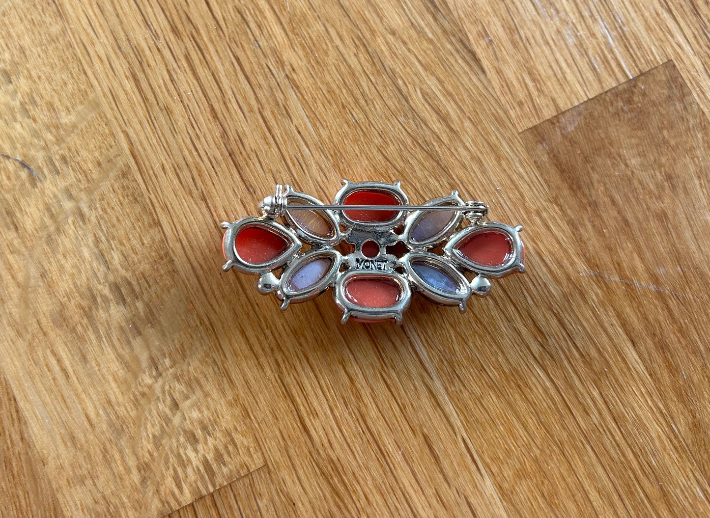 Coral and orange brooch