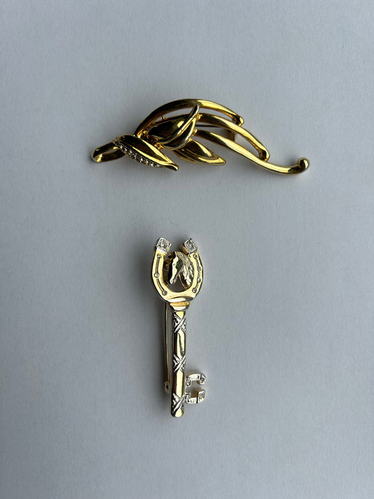 Golden brooch set