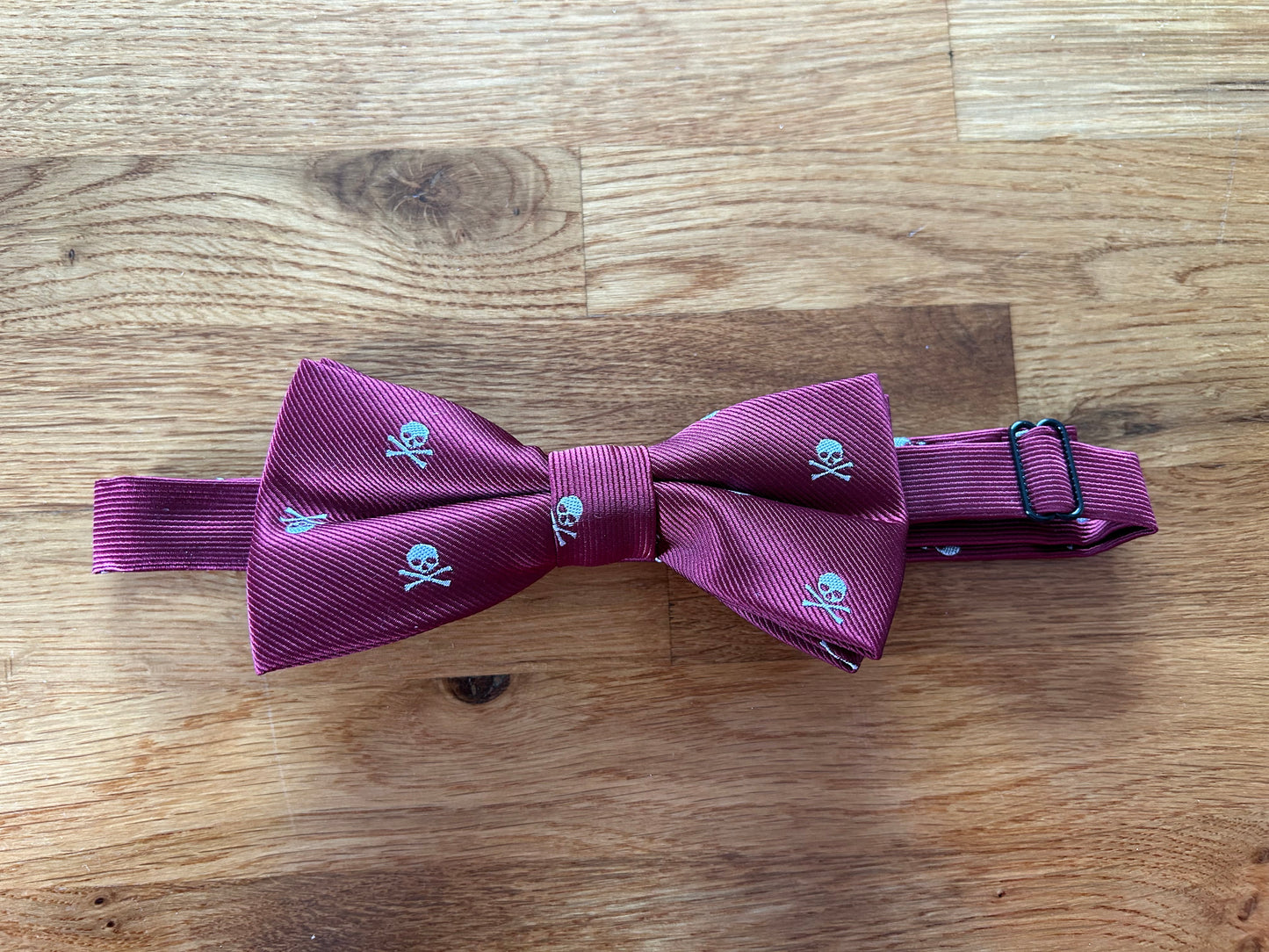 Maroon skull bow tie