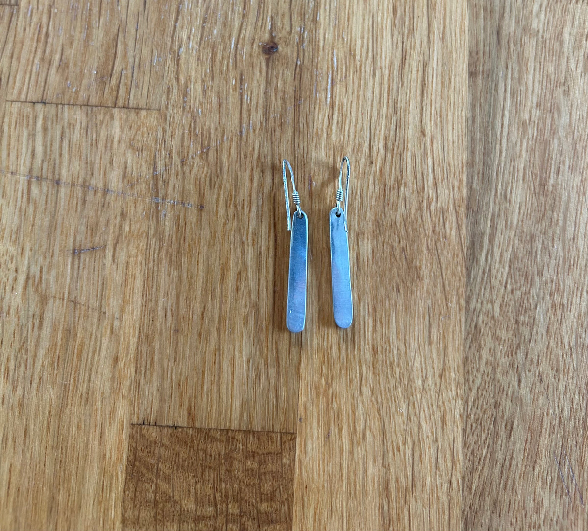 Long silver pendant earrings