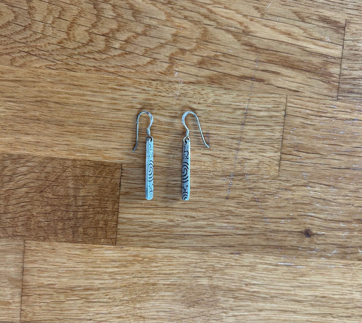 Long silver pendant earrings