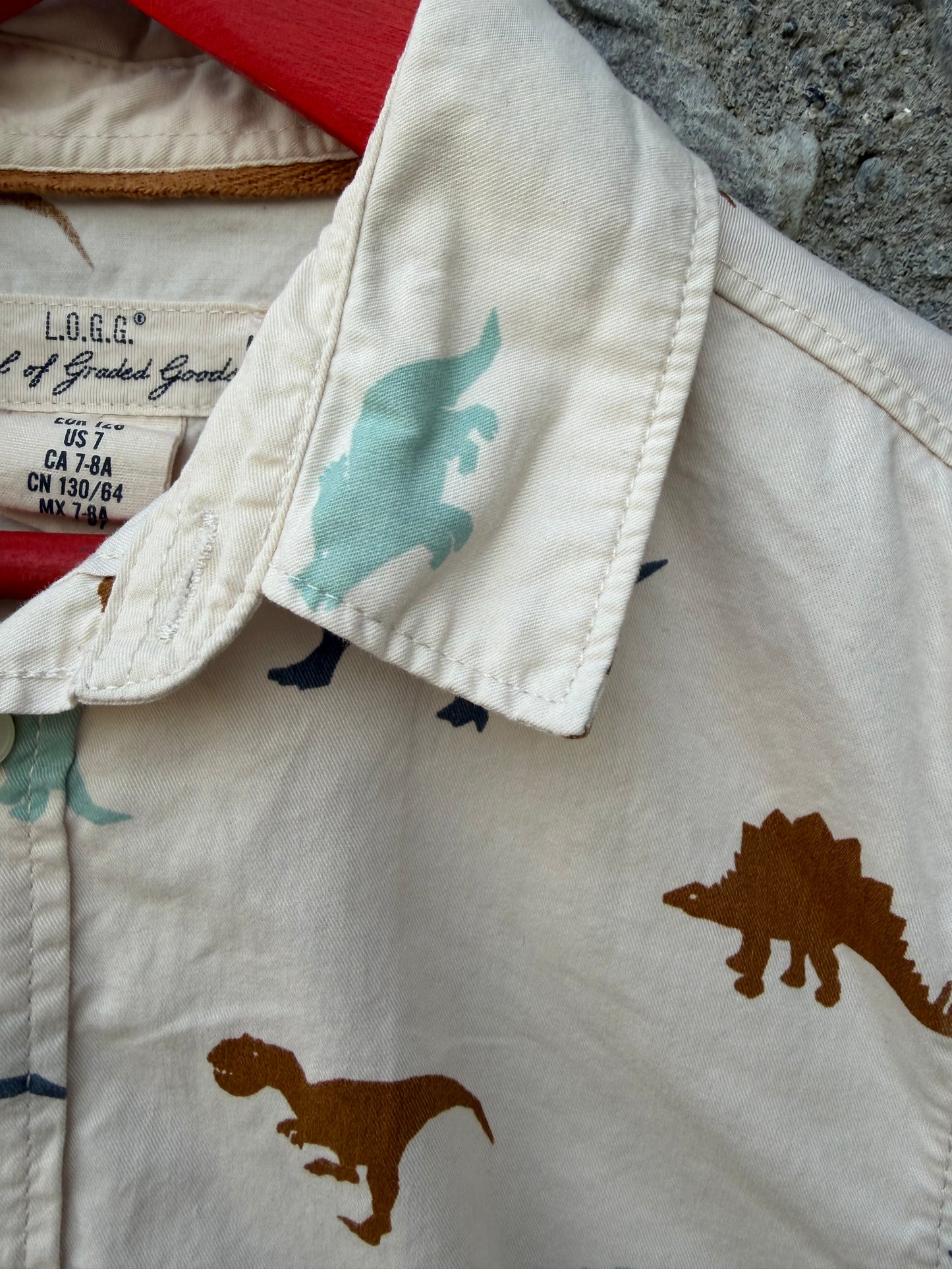 Dinosaurs beige shirt  7-8y (122-128cm)