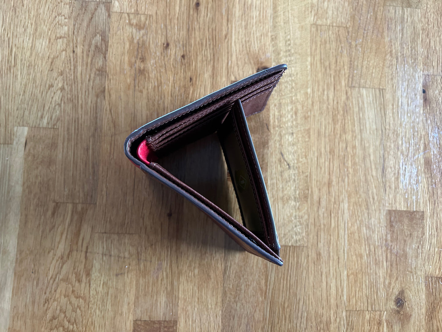 Brown and red wallet