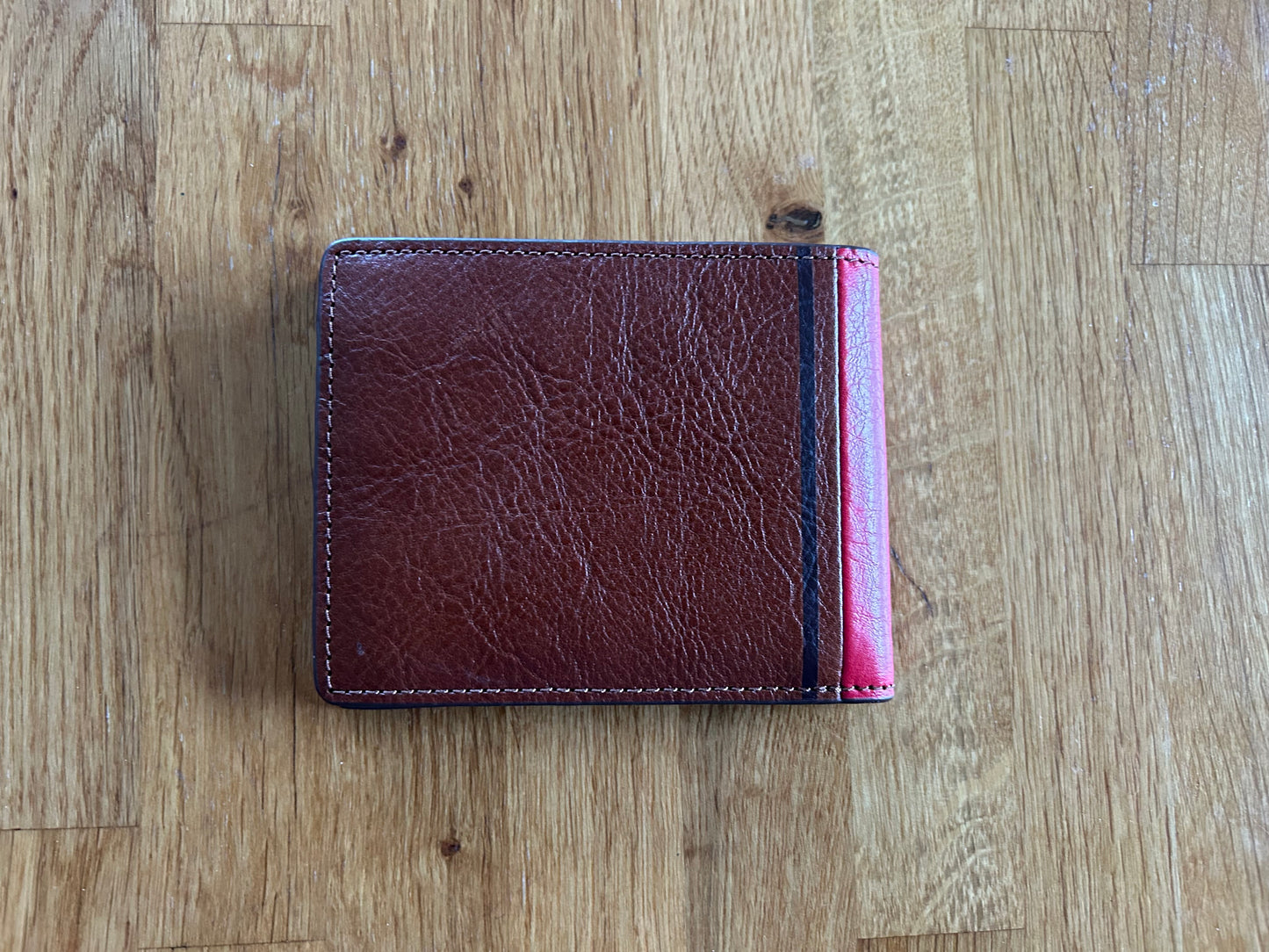 Brown and red wallet