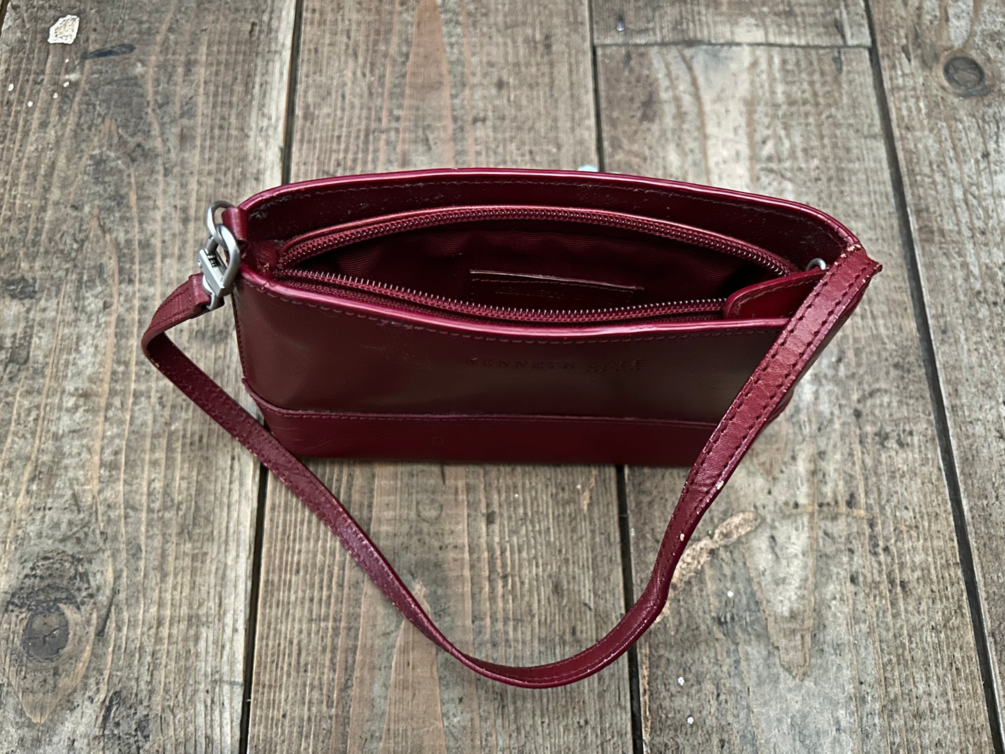 Small maroon handbag