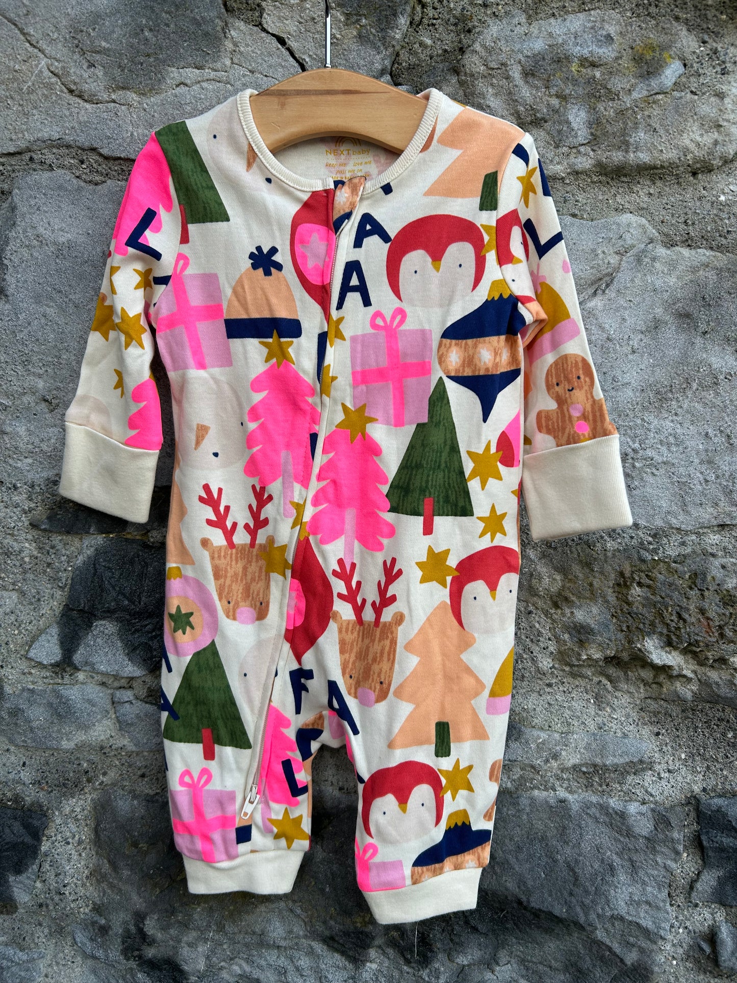 Pink festive onesie 0-3m (56-62cm)