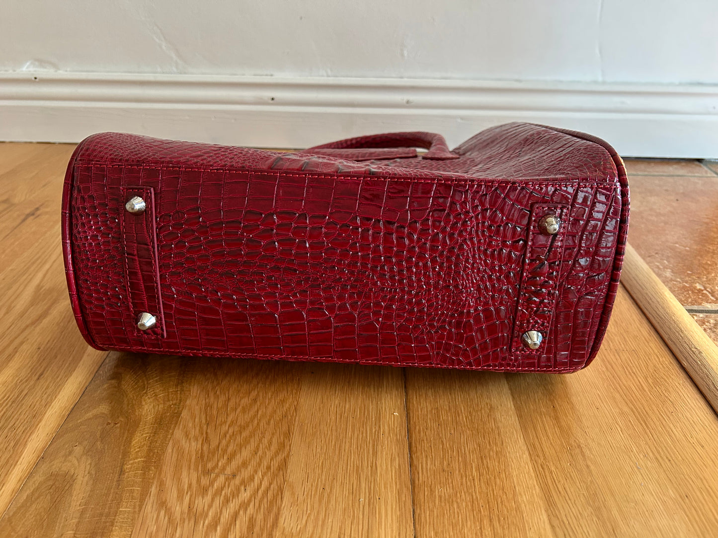 Red crocodile style handbag
