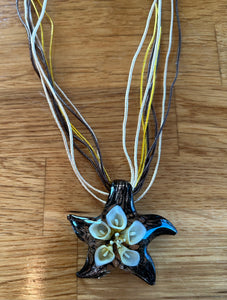 Brown star glass necklace