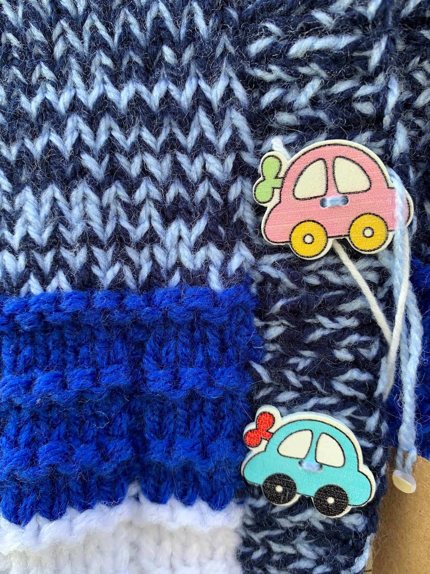 Cardigan with car buttons