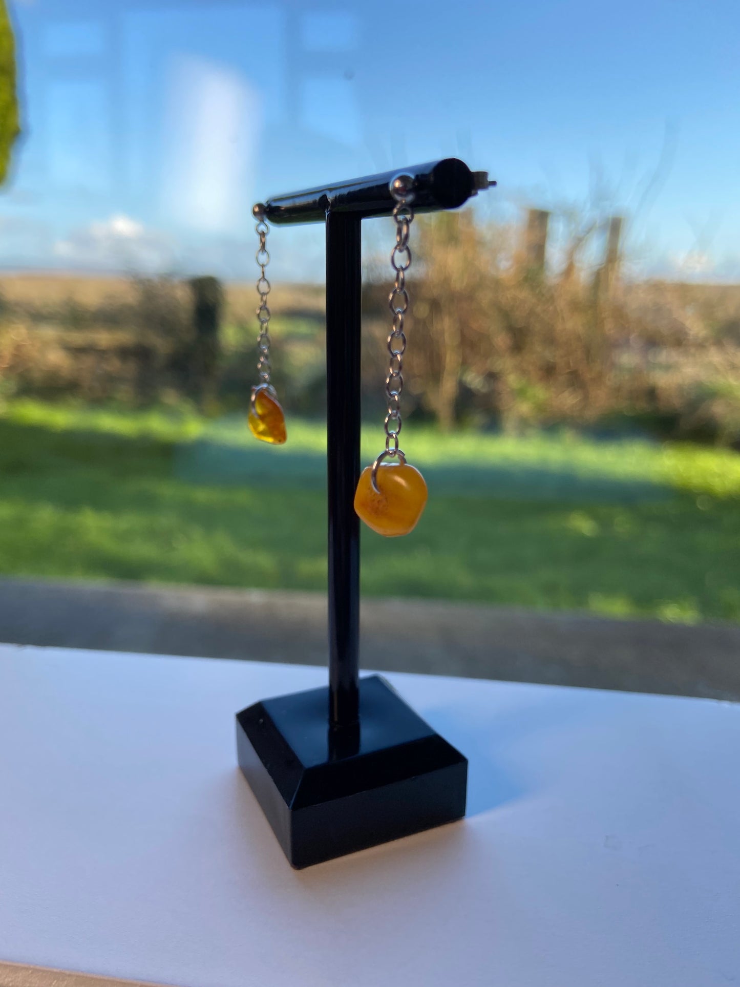 Pendant amber earrings