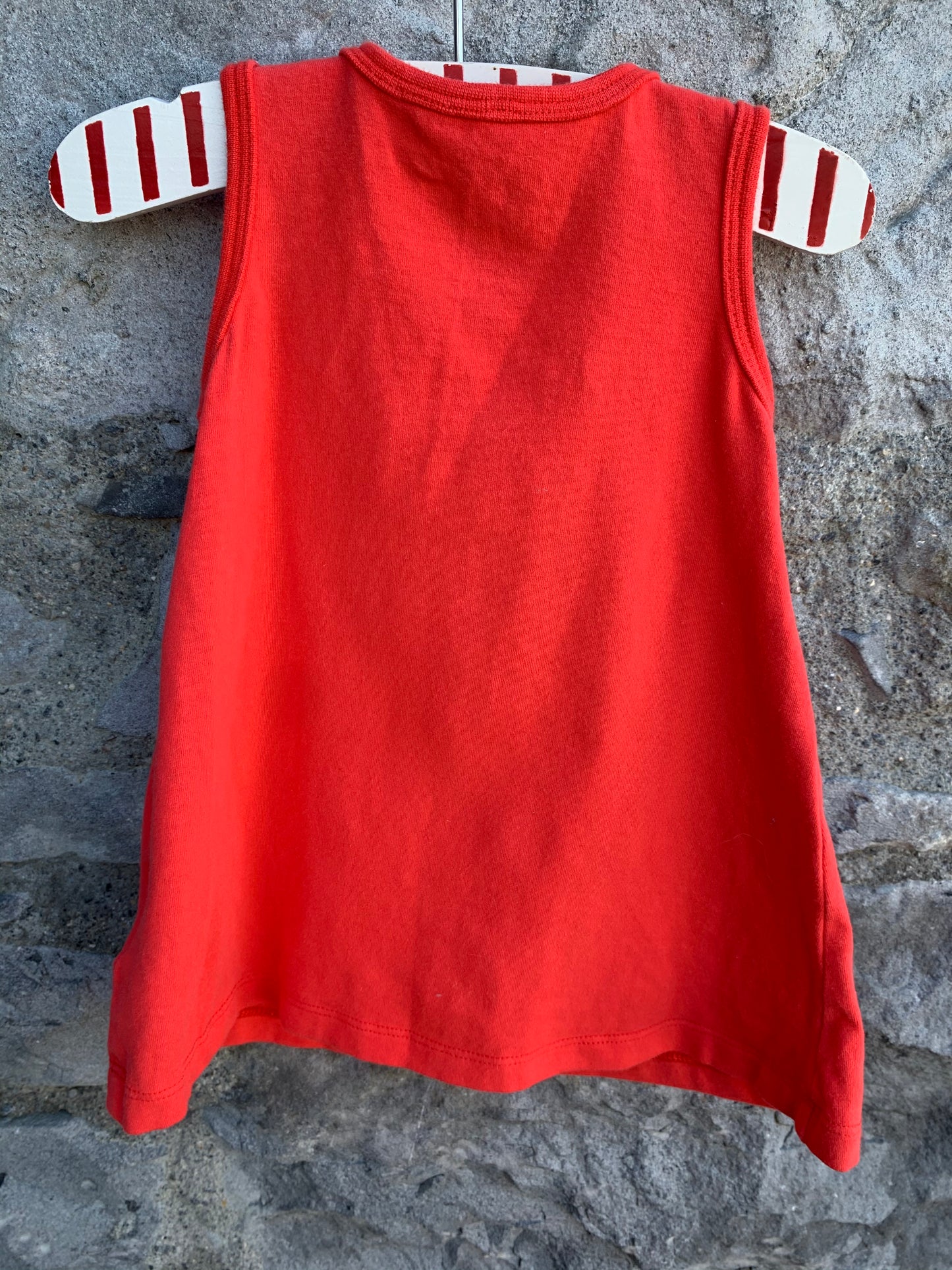 Red pinafore  0-3m (56-62cm)