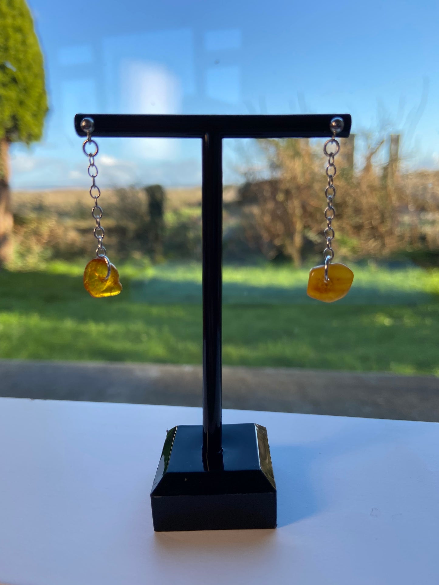 Pendant amber earrings