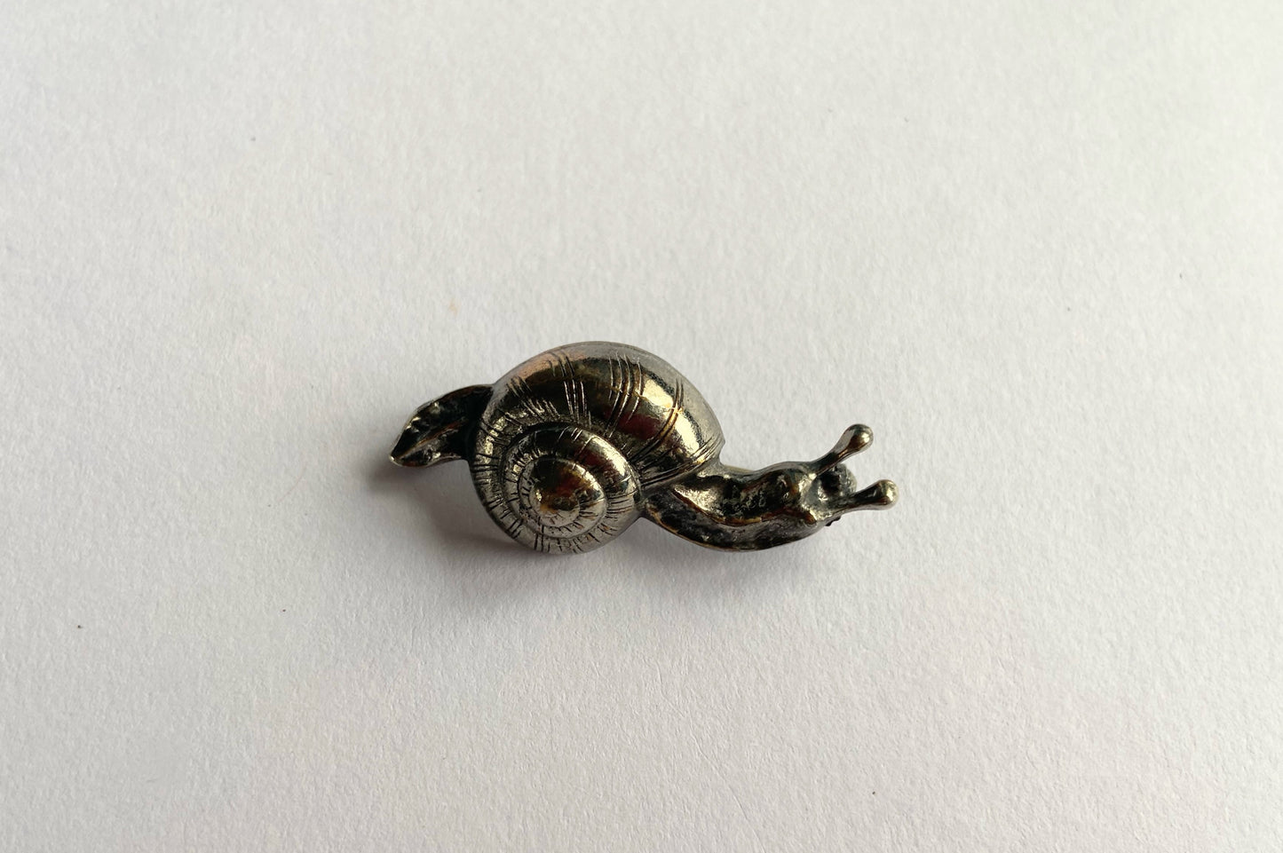 Snail brooch