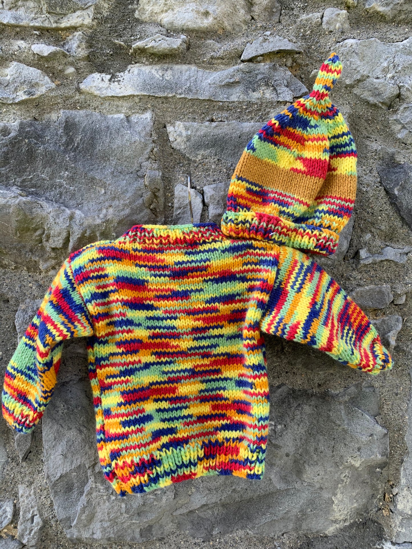 Colourful melange cardigan with a hat