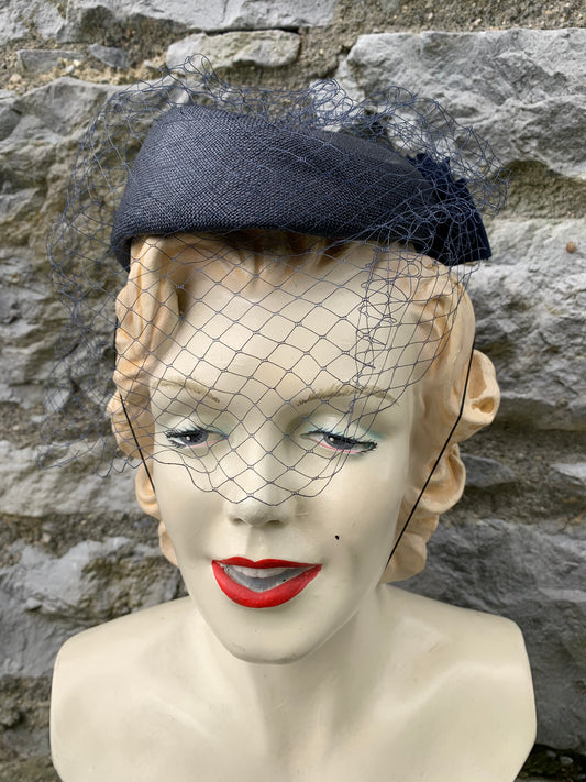 Navy hat with a long net