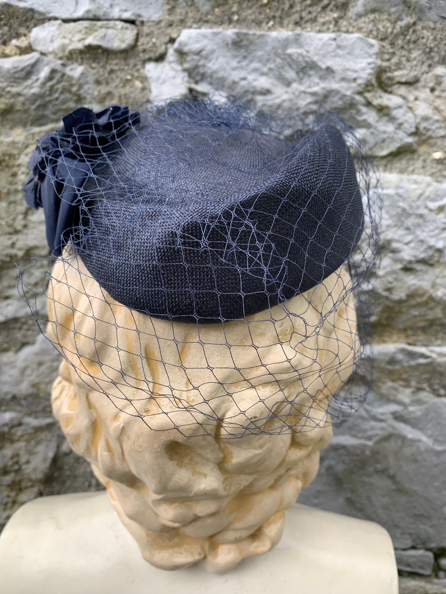 Navy hat with a long net