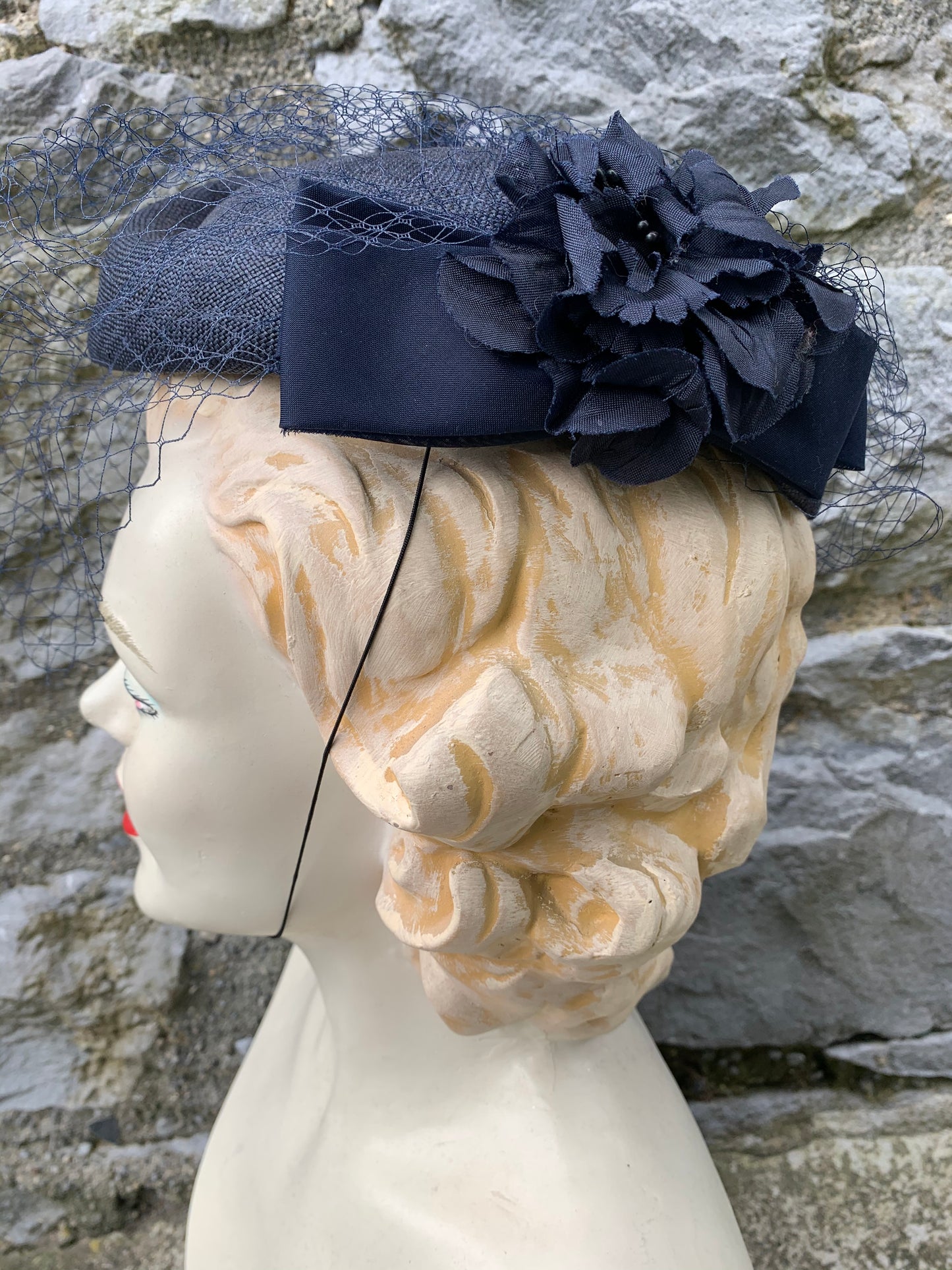 Navy hat with a long net