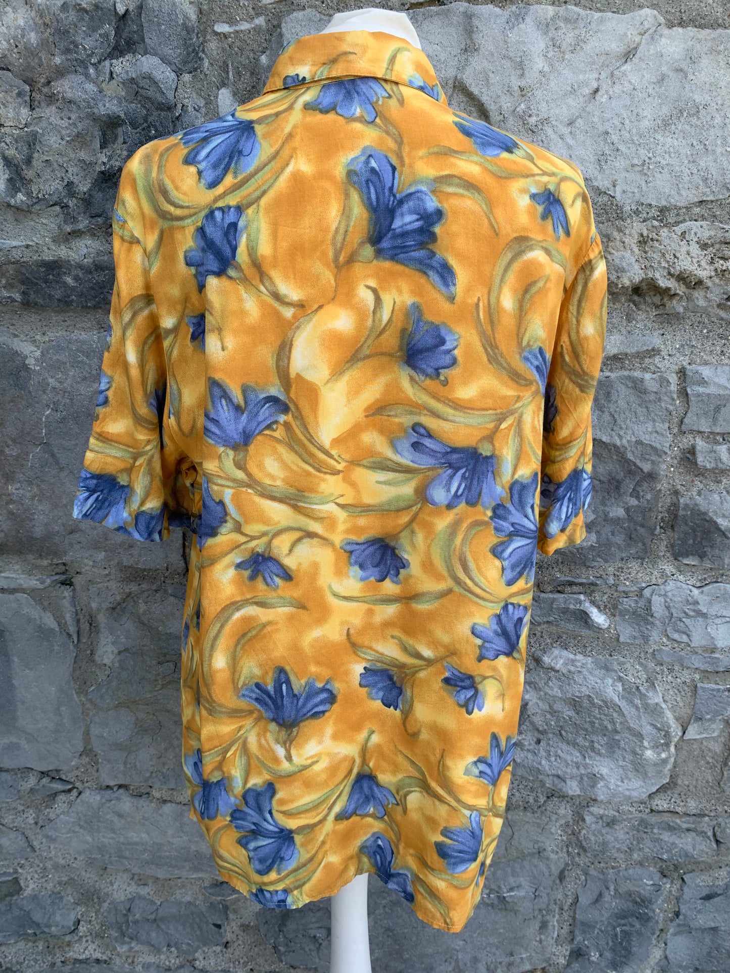 Yellow shirt with blue flowers    Medium